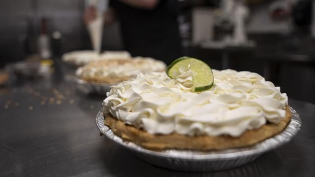 A freshly decorated Key Lime pie rests on a counter in a busy bakery kitchen at Michele's Pies, Wednesday, March 13, 2024, in Norwalk, Conn. Math enthusiasts and bakers celebrate Pi Day on March 14 or 3/14, the first three digits of a mathematical constant with many practical uses. Around the world many people will mark the day with a slice of sweet or savory pie. (AP Photo/John Minchillo) A freshly decorated Key Lime pie rests on a counter in a busy bakery kitchen at Michele's Pies, Wednesday, March 13, 2024, in Norwalk, Conn. Math enthusiasts and bakers celebrate Pi Day on March 14 or 3/14, the first three digits of a mathematical constant with many practical uses. Around the world many people will mark the day with a slice of sweet or savory pie. (AP Photo/John Minchillo)