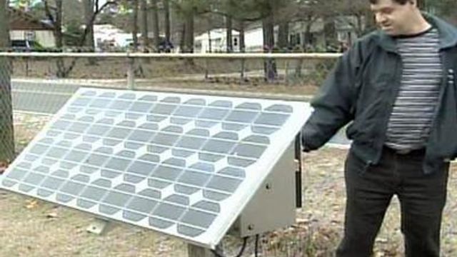 Fayetteville man uses solar energy to light tree