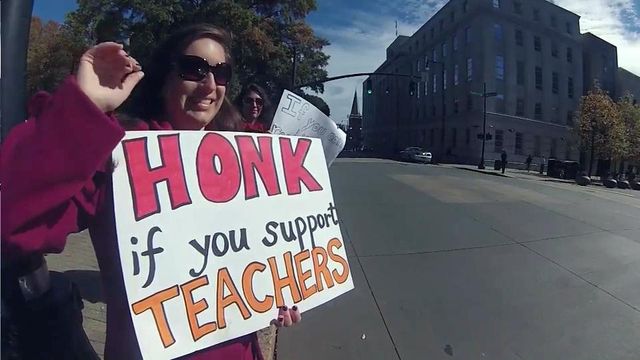 Teachers wear red in protest of cutbacks
