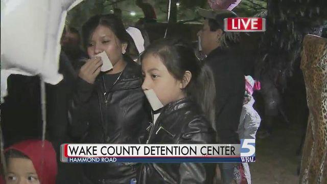 Advocacy group holds vigil in response to federal immigration raids