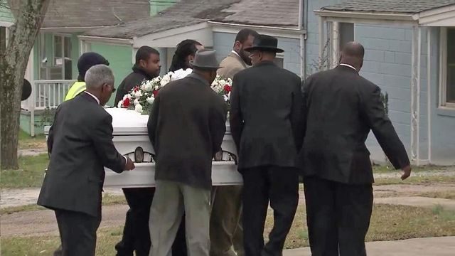Questions remain as Denkins is laid to rest