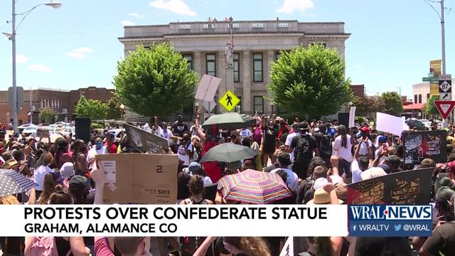 Large crowds gather for, against Confederate statue