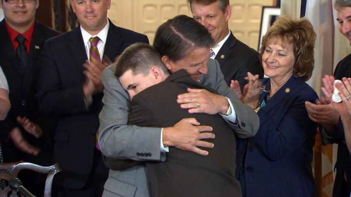 Gov McCrory hugs victim 