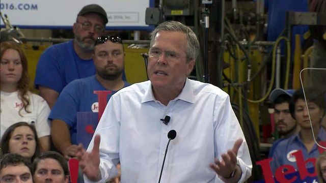 Bush says tax plan would boost economy