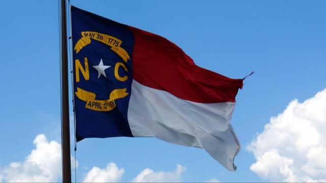 This is a picture of the North Carolina flag, although it's a bit tattered. 
