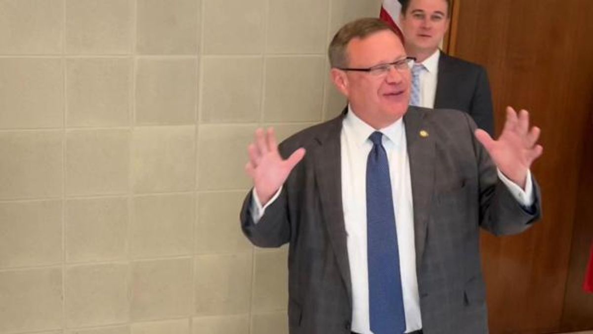 Senate President Pro Tem Phil Berger (left) and Speaker of the House Tim Moore emerge Thursday, June 24, 2022, from state budget negotiations at the North Carolina General Assembly.