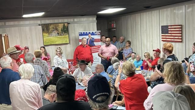 Lt. Gov. Mark Robinson speaks with supporters at Shep's Grill in Washington, NC, as he campaigns for governor on Aug. 29, 2024.