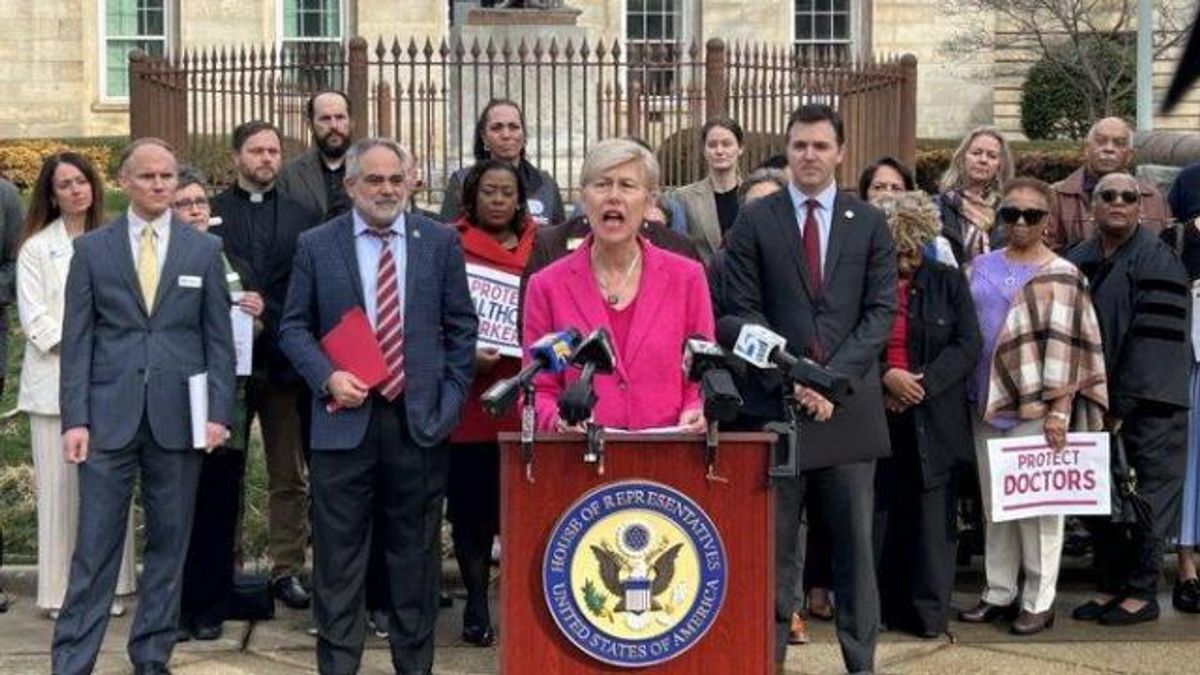 U.S. Rep. Deborah Ross (D-NC) criticizes Republican President Donald Trump's spending cut plans, flanked by Wake County school board chair Chris Heagarty, Attorney General Jeff Jackson and others in a speech at the state Capitol on Friday, Jan. 31, 2024.