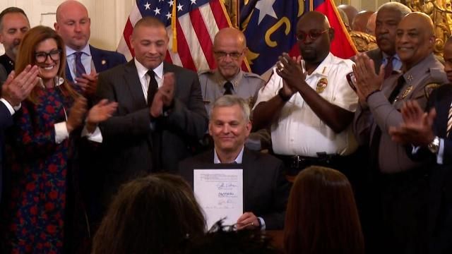 Gov. Josh Stein signs bills into law on July 9, 2025.