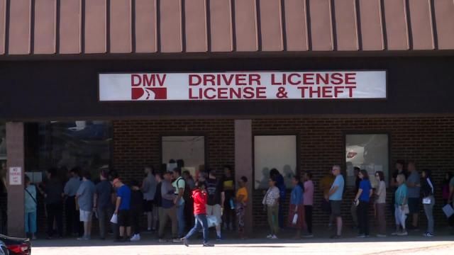 A file photo of a long line at the DMV.