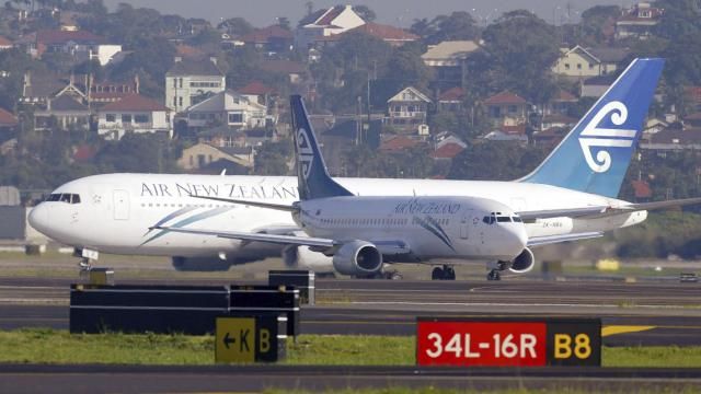 FILE - Two Air New Zealand passenger jets taxi past each other at Sydney Airport on July 13, 2003. A passenger has been fined for urinating in a cup during a delay on deplaning after landing at Sydney Airport. Officials said on Friday, April 5, 2024, in incident after a 3-hour Air New Zealand flight from Auckland occurred in December last year and a Sydney court fined the 53-year-old man 600 Australian dollars for offensive behavior in February. (AP Photo/Mark Baker, File) FILE - Two Air New Zealand passenger jets taxi past each other at Sydney Airport on July 13, 2003. A passenger has been fined for urinating in a cup during a delay on deplaning after landing at Sydney Airport. Officials said on Friday, April 5, 2024, in incident after a 3-hour Air New Zealand flight from Auckland occurred in December last year and a Sydney court fined the 53-year-old man 600 Australian dollars for offensive behavior in February. (AP Photo/Mark Baker, File)