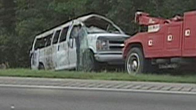 Raw video: Passenger van runs off I-95