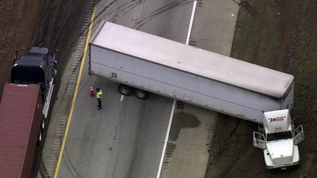 Sky 5: Jackknifed tractor-trailer closes I-40 in Orange