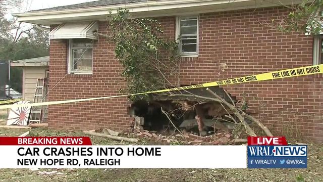 Vehicle leaves gaping hole in Raleigh home