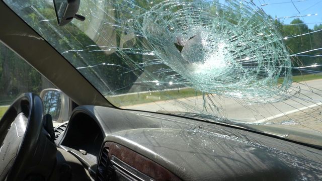 Pipe punctures windshield on I-40