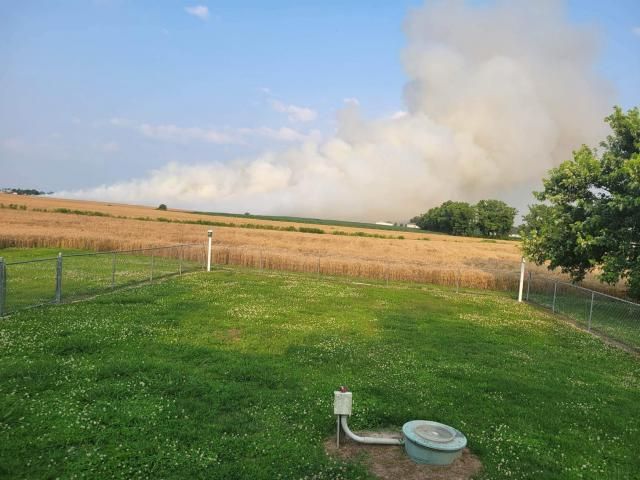 Fire in wheat field near I-795