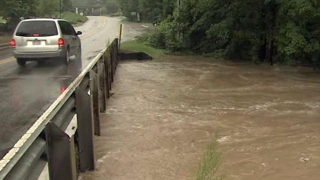 Heavy rain floods Little Creek in Clayton