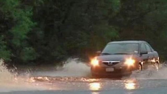 Wilmington residents wade through flood waters
