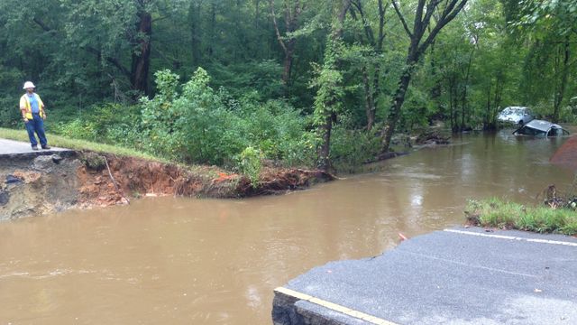 Flooding collapses Warrenton road, sweeps away cars