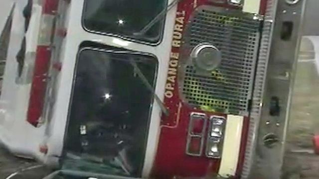 Fire truck flips in Orange Co.