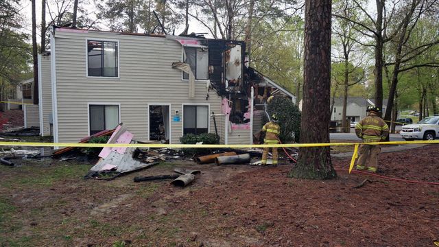Apartment complex heavily damaged after lightning sparks fire