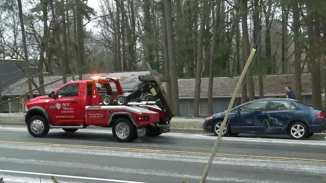 Icy roads mean busy day for tow truck drivers