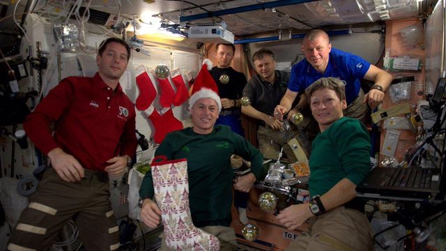 On space station, a canned, dehydrated Christmas feast