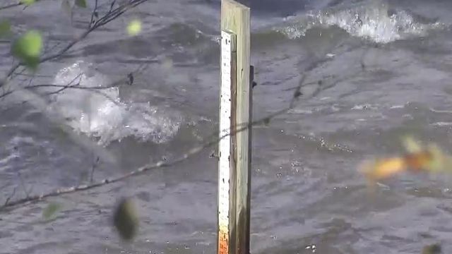 Officials trying to lower Falls Lake after rain, flooding
