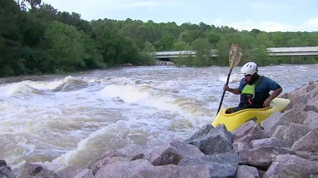 Waters rush as officials attempt to drain Falls Lake