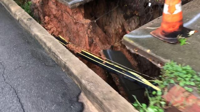 Raw: Sidewalk collapses in Raleigh due to heavy rain