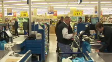 Residents making last-minute stops at grocery stores