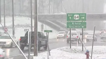 Snowy conditions in Rocky Mount as system moves through area