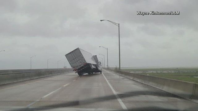 Strong winds from Hurricane Sally knock over tractor-trailer