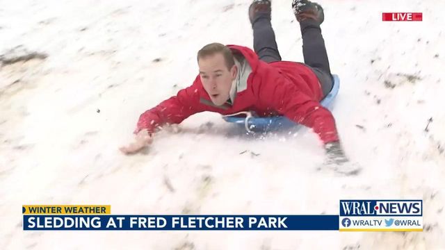 WRAL's Joe Fisher goes sledding at Fletcher Park in Raleigh