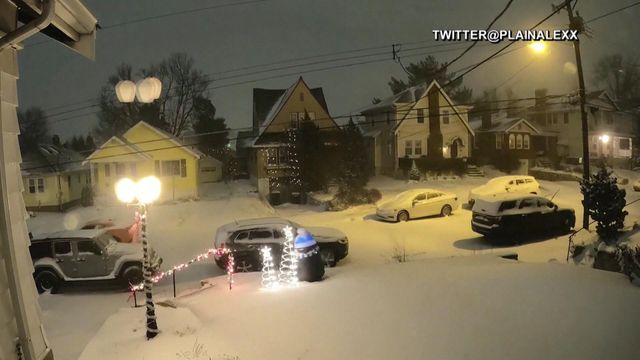 Timelapse: Snow blows in, blankets cars, houses