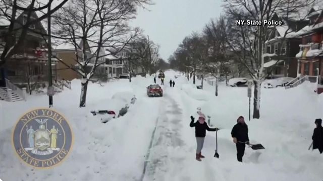Caught on cam: New Yorkers dig out from Christmas blizzard