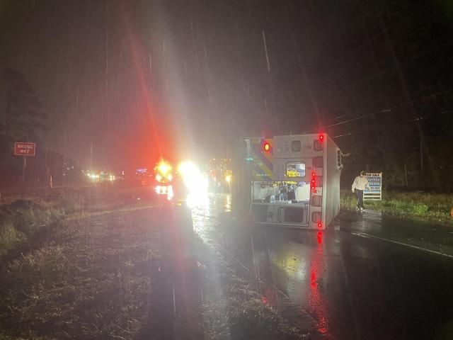 Ambulance flips over due to dangerous road conditions, rain from Idalia