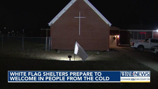 White flag shelters prepare to welcome in people from the cold