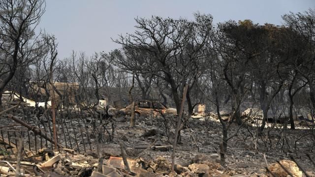 FILE - Burnt trees and a car after yesterday's fire in Mandra, west of Athens, on Wednesday, July 19, 2023. Europe is the fastest-warming continent and its temperatures are rising at roughly twice the global average, two top climate monitoring organizations reported Monday, April 22, 2024, warning of the consequences for human health, glacier melt and economic activity. (AP Photo/Thanassis Stavrakis, File) FILE - Burnt trees and a car after yesterday's fire in Mandra, west of Athens, on Wednesday, July 19, 2023. Europe is the fastest-warming continent and its temperatures are rising at roughly twice the global average, two top climate monitoring organizations reported Monday, April 22, 2024, warning of the consequences for human health, glacier melt and economic activity. (AP Photo/Thanassis Stavrakis, File)