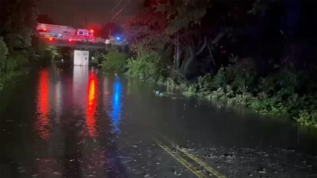 A truck stuck on a flooded road in Durham.