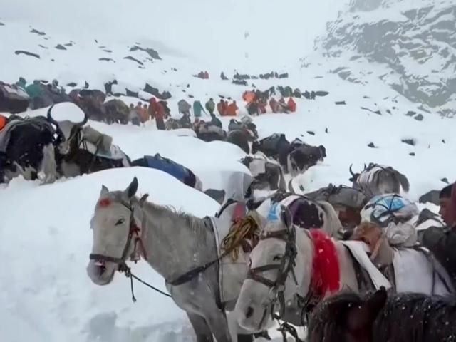 Trekker uses cooking pots to dig her way out of freak blizzard on Everest