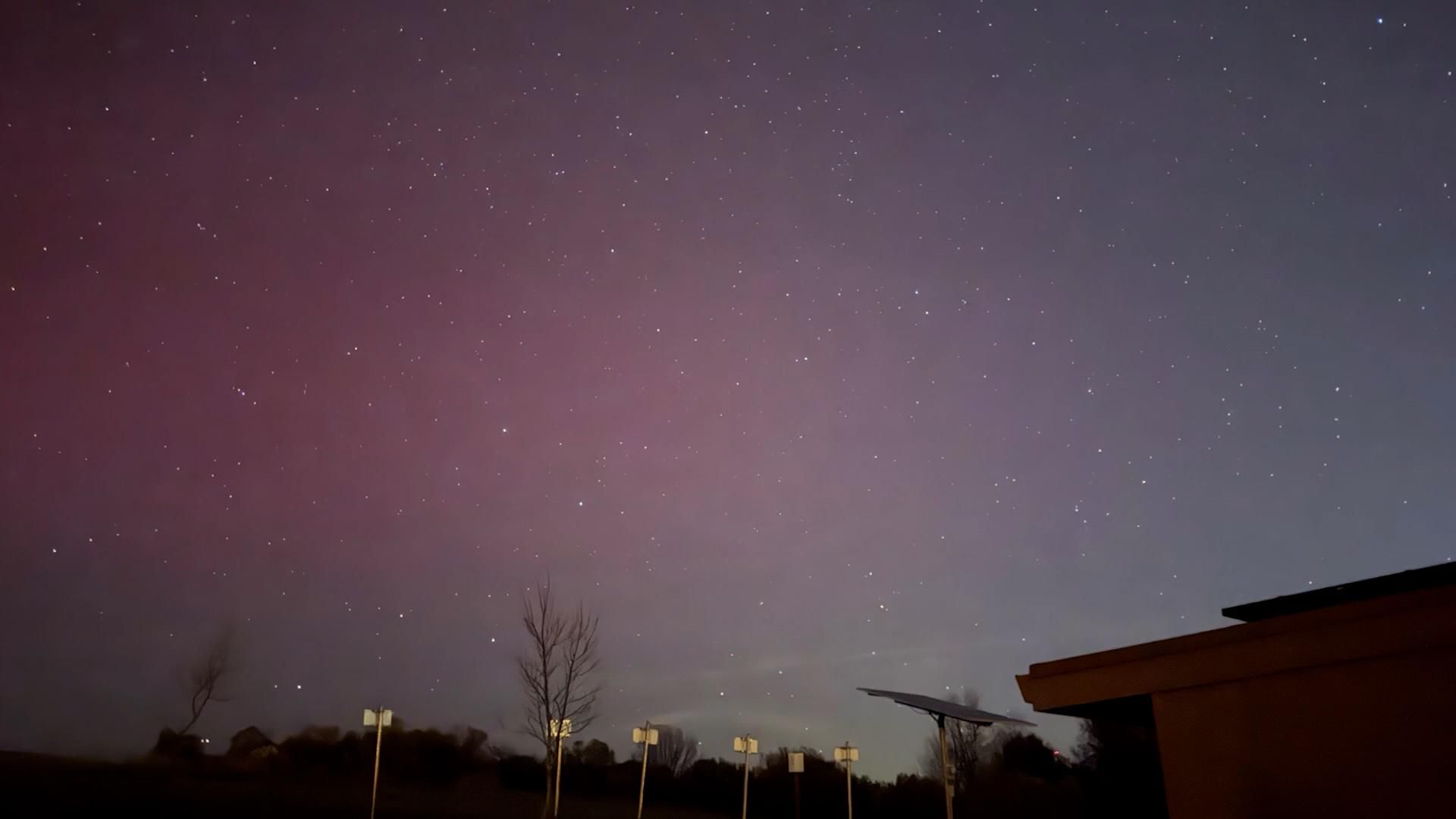 Above the clouds, aurora brings glow to US skyline