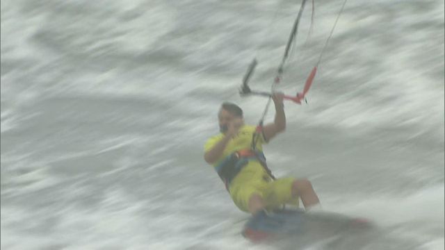 Windsurfer braves Florence's chop