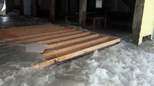Florence parks waves in garage on North Topsail Beach
