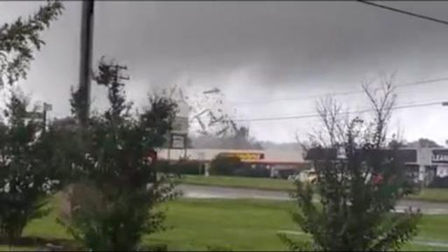 Raw: Tornado rips apart buildings in Richmond
