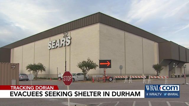 Family seeks shelter from Hurricane Dorian at Northgate Mall in Durham