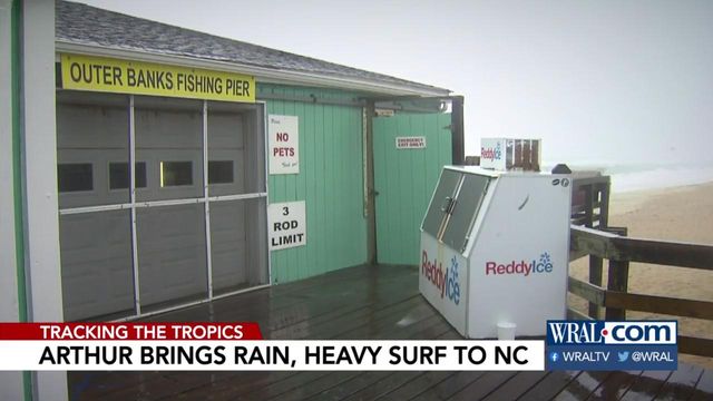 Tropical Storm Arthur moves out, but forces newly reopened businesses to close for a day