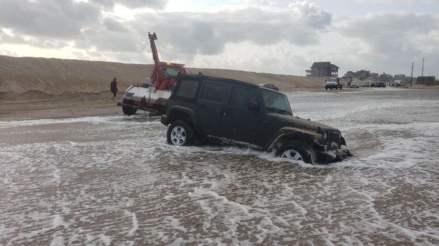 Drivers stranded, vehicles flooded as waves wash over Outer Banks