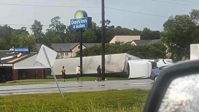 A viewer submitted a picture of a tractor-trailer on its side near a Days Inn and Suites.