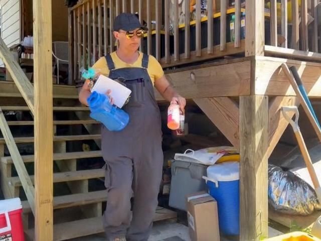 罗利妇女在家乡埃德尼维尔领导海伦清理工作